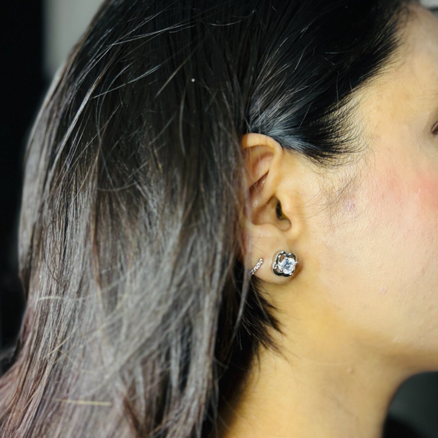 The "Twisted Radiance" Silver CZ Stud Earrings - Inspired Design, Brilliant Sparkle NoorDazzle