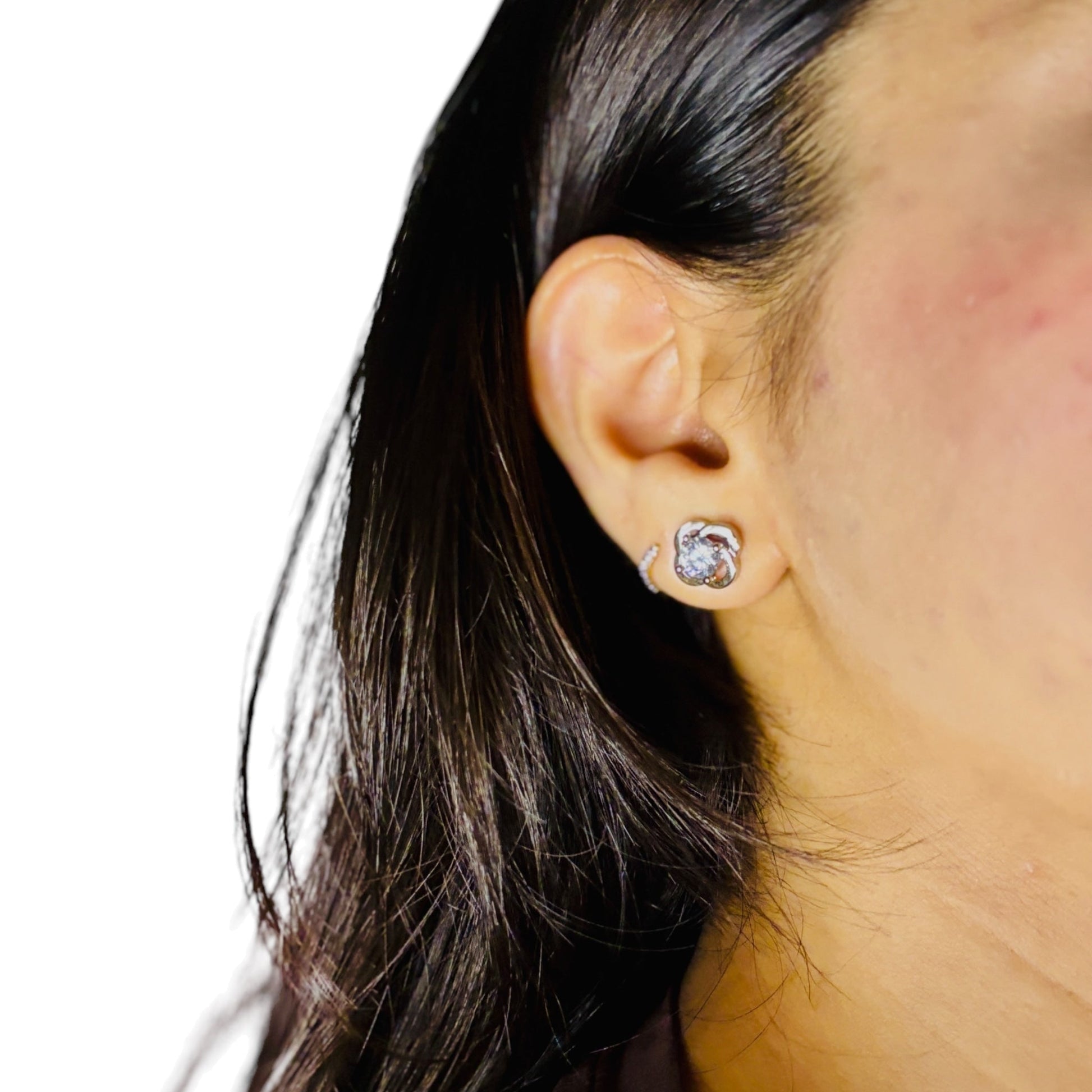 The "Twisted Radiance" Silver CZ Stud Earrings - Inspired Design, Brilliant Sparkle NoorDazzle