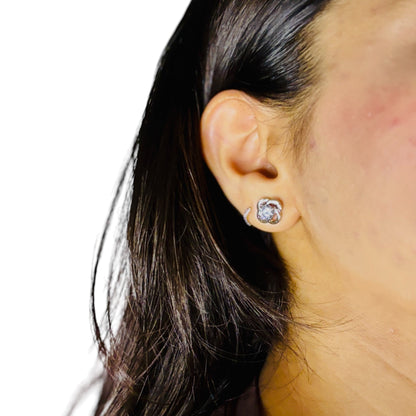 The "Twisted Radiance" Silver CZ Stud Earrings - Inspired Design, Brilliant Sparkle NoorDazzle